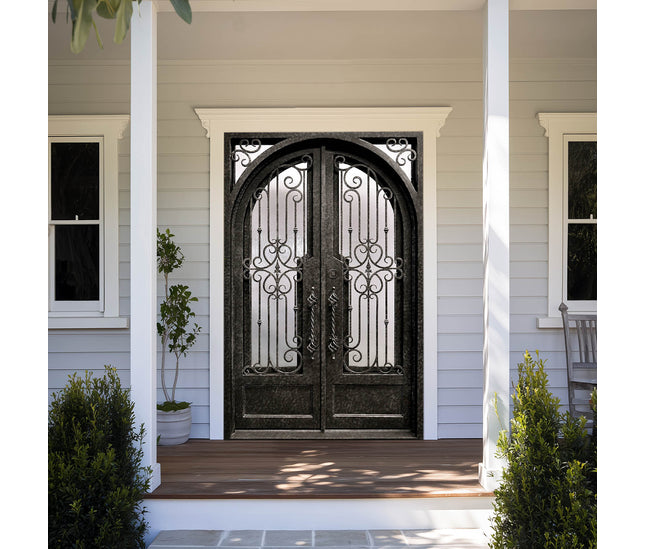 decorative iron exterior double door with intricate scrollwork and kickplate